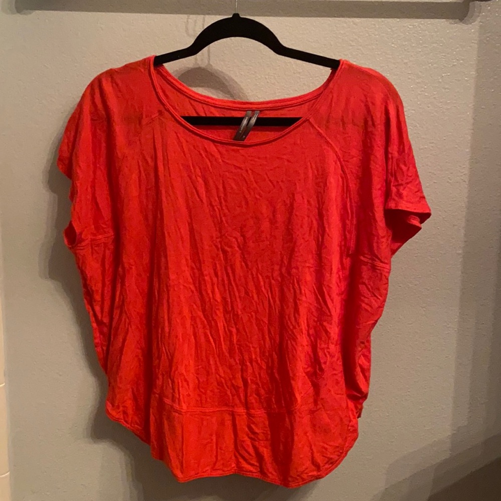 Bright orange short sleeve top